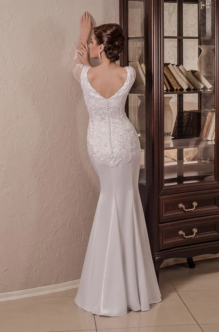 ---Elegant and sensual winter wedding dress with long lace sleeves that create a tattoo effect, V-neck bodice--