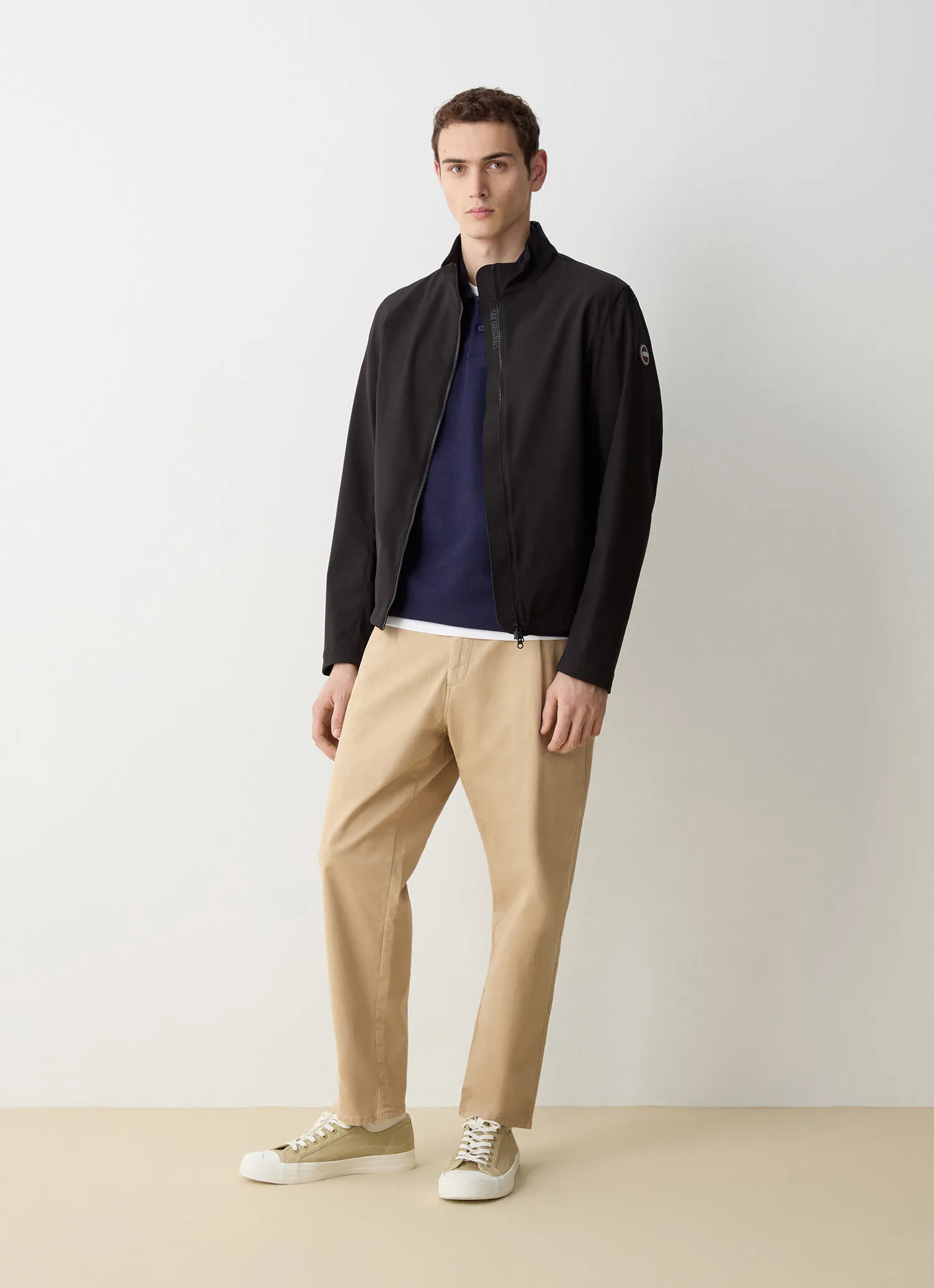 Softshell jacket with adjustment at the hem