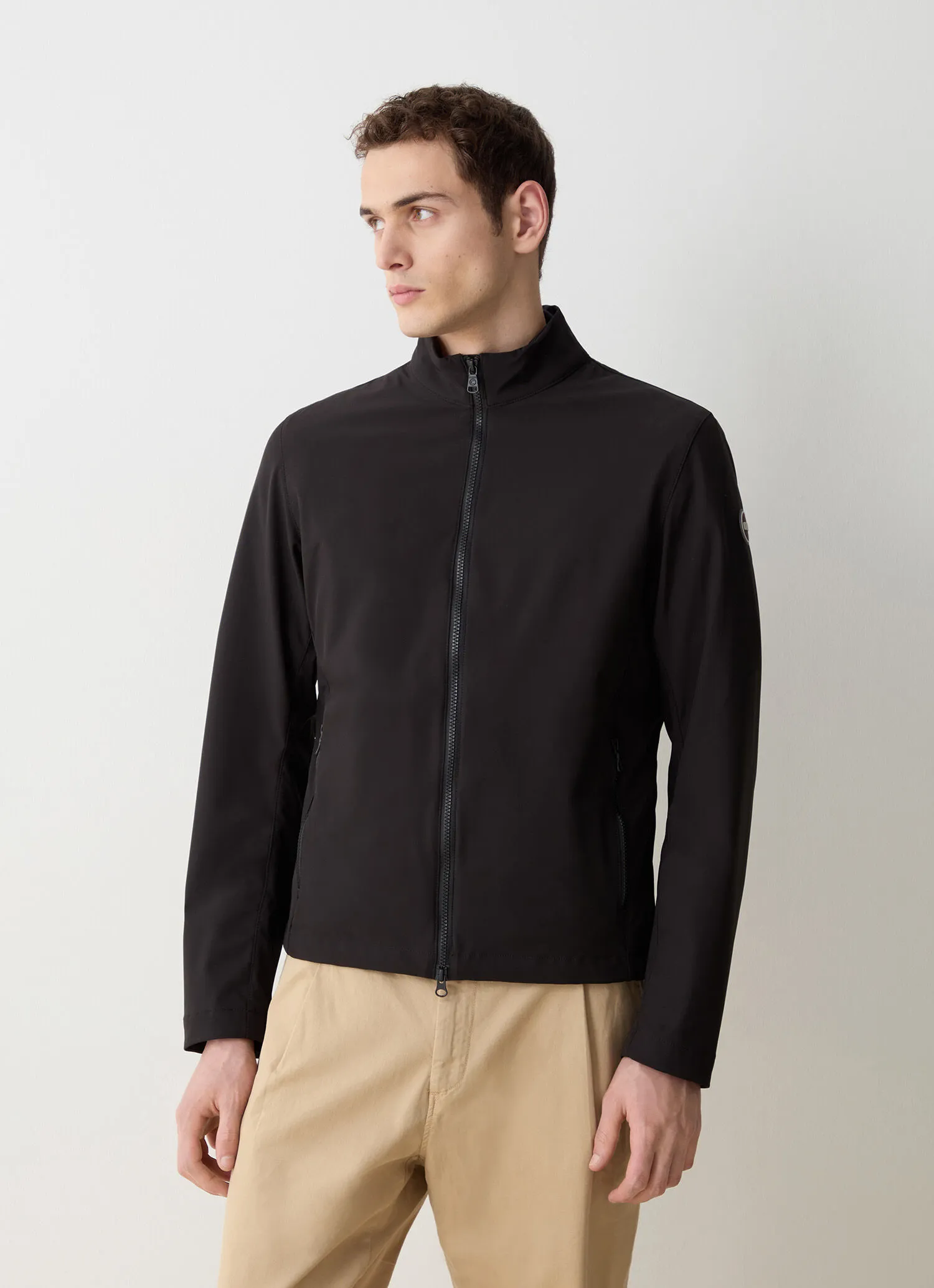 Softshell jacket with adjustment at the hem