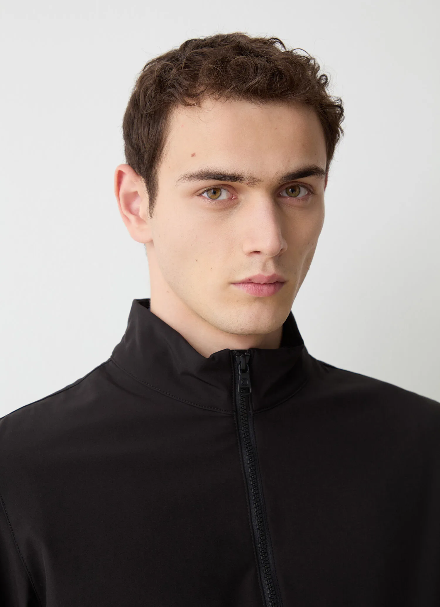 Softshell jacket with adjustment at the hem